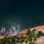And aerial view of fishing boats at the shores of Ada in Ghana.