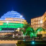 Kigali, Rwanda - August 19 2022: Kigali Convention Centre at night, lit up in the colors of the Rwandan flag. The facility is designed to host a variety of events and is a top attraction in the city.